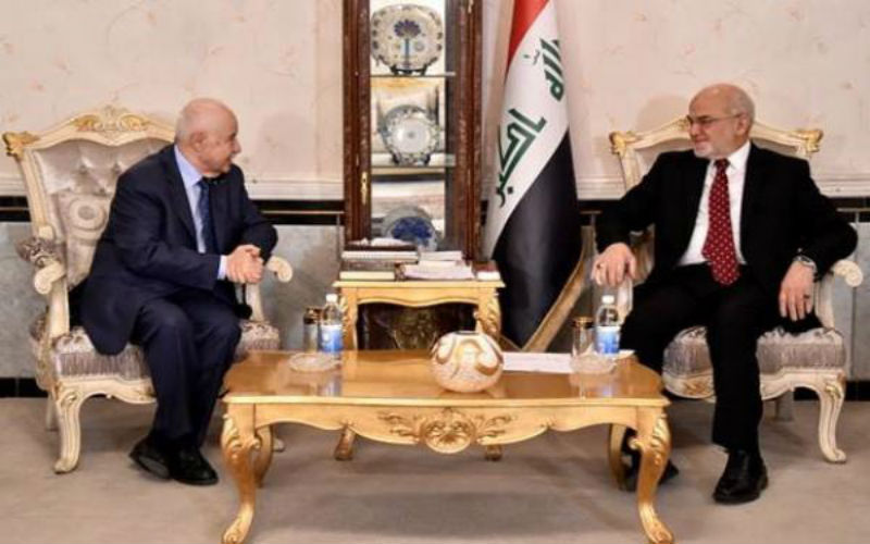 أبوغزالة يلتقي العبادي ويحاضر في معهد