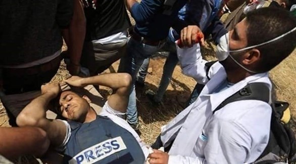 بالصور: غزة تودع الشهيد الصحافي ياسر