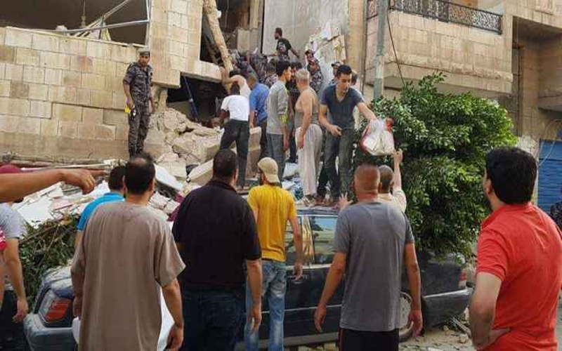 وفاة رابعة بانهيار شقة الغويرية- صور