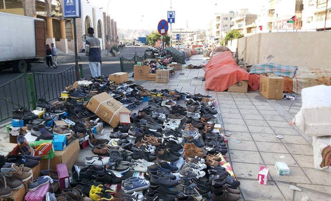 اصحاب بسطات يعتدون على رئيس بلدية