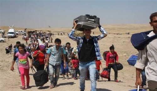 نازحو الموصل يطالبون الحكومة فتح باب