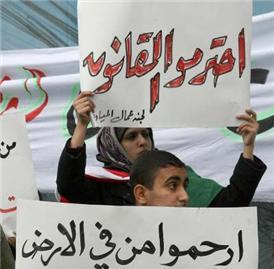 عمال في الكرك يطالبون برفع الحد