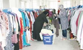 بنك الملابس الخيري والشركة الاهلية يوقعان