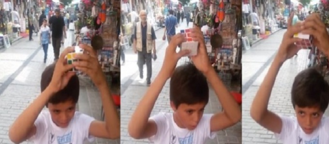 طفل سوري يحل لغز (روبيك) بوقت