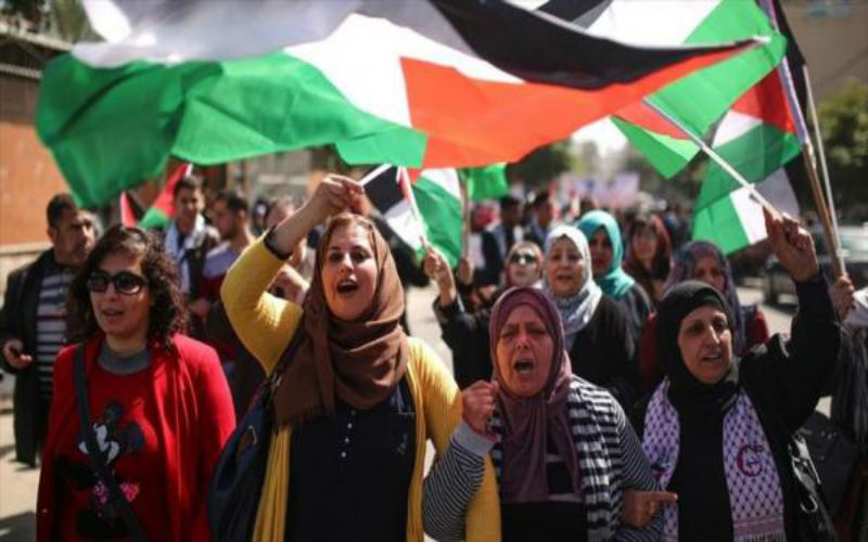 مسيرة نسوية في قطاع غزة بمناسبة
