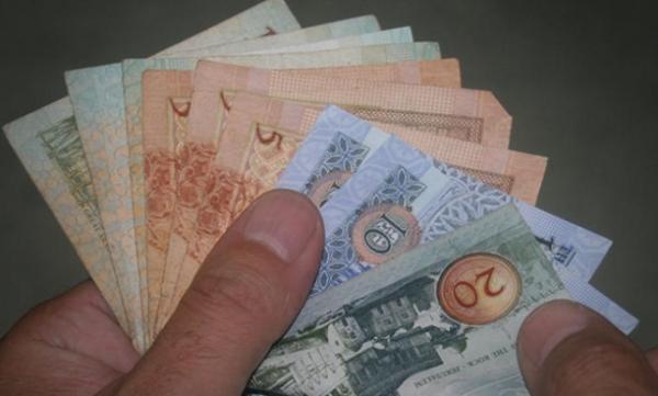 الضريبة تبدأ بصرف دعم موظفي الشركات