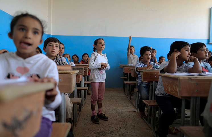 مدارس في سوريا تمحو الأسد من