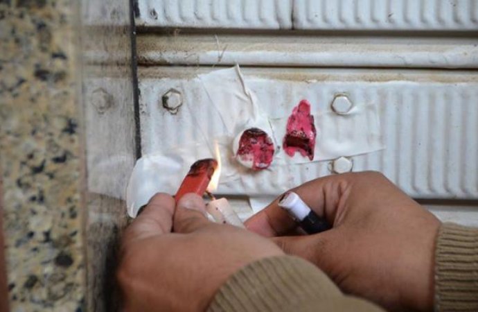 اغلاق محطة غيار زيوت بالشمع الاحمر