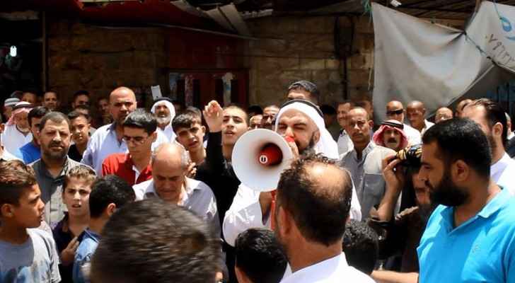 بالصور.. وقفة الكرك تستهجن 39الصمت العربي39