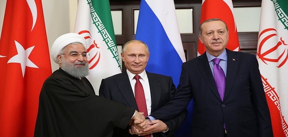 أردوغان يبحث مع بوتين وروحاني التطورات