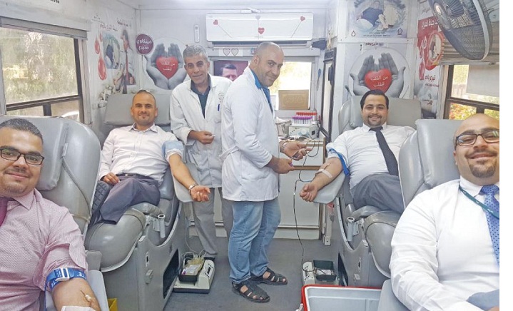 البنك الأهلي ينظم حملة «كلنا أهل