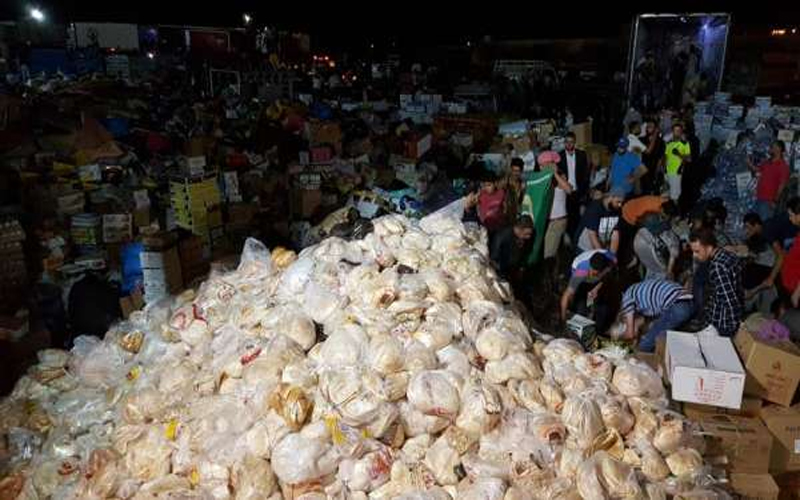 بالصور.. نحو 50 برادا محملا بالمساعدات