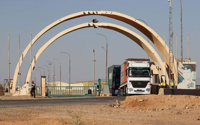 العراق يلغي شرط تجميع الشاحنات في