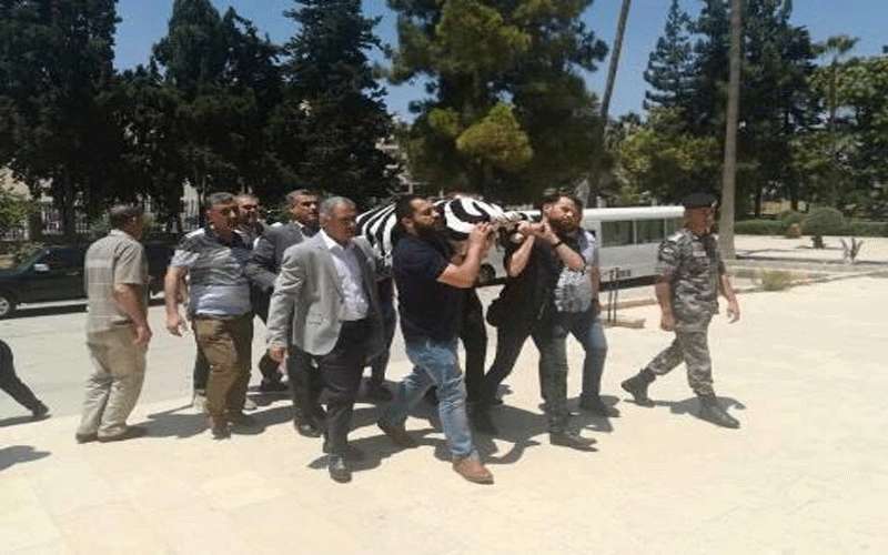 الدرك يشيعون عراقية وحيدة