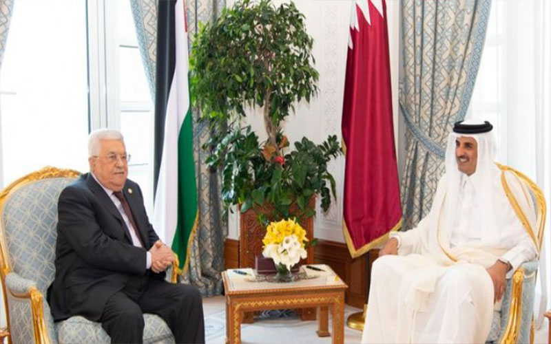 عباس يلتقي الشيخ تميم في قطر