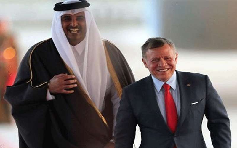 الملك يهنئ الشيخ تميم