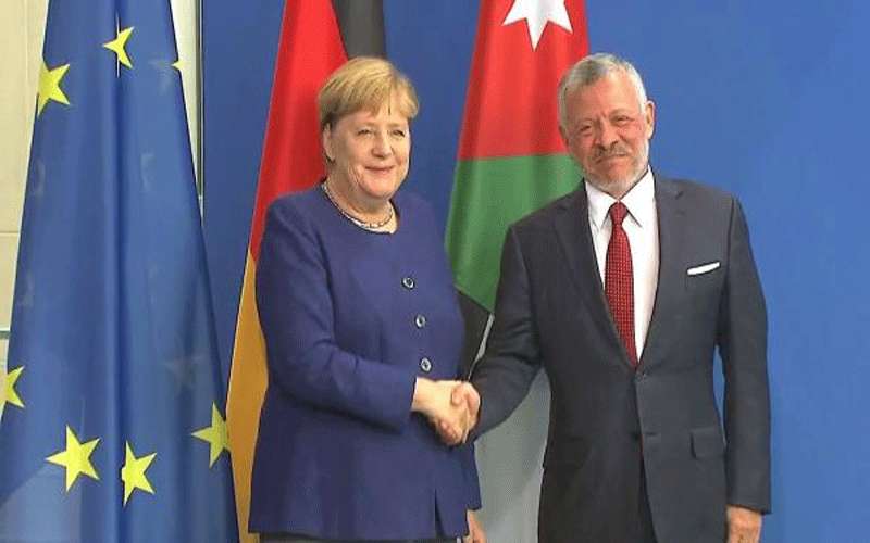 الملك لـ ميركل: توحيد الجهود لوقف