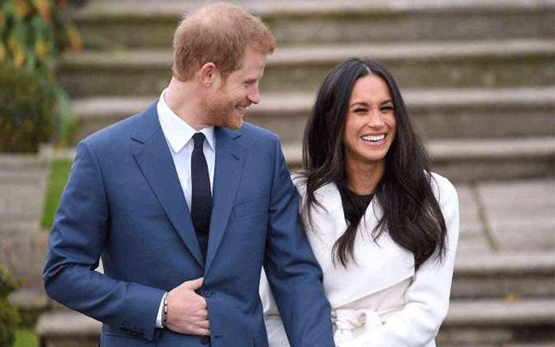 الأمير هاري وزوجته يوقعان عقدا مع