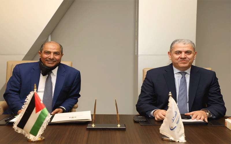 الأحوال المدنية والجوازات وبنك الاسكان يوقعان