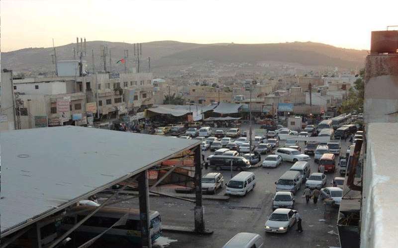 إغلاق مجمع باصات مخيم البقعة