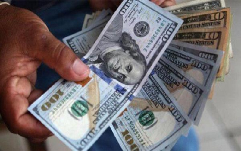 العراق يخفض سعر صرف الدينار ..