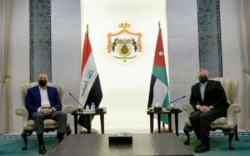 الملك ورئيس الوزراء العراقي يبحثان توسيع