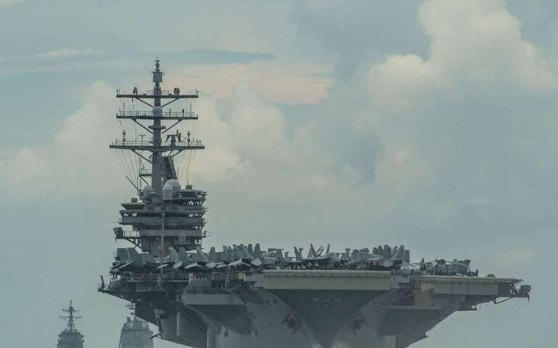 بكين: واشنطن ترسل السفن والطائرات إلى