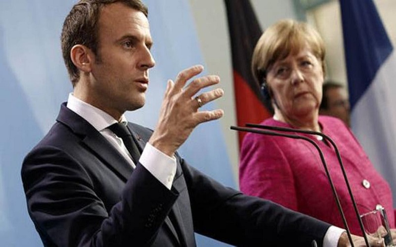 ماكرون وميركل يدافعان عن استراتيجية اللقاحات