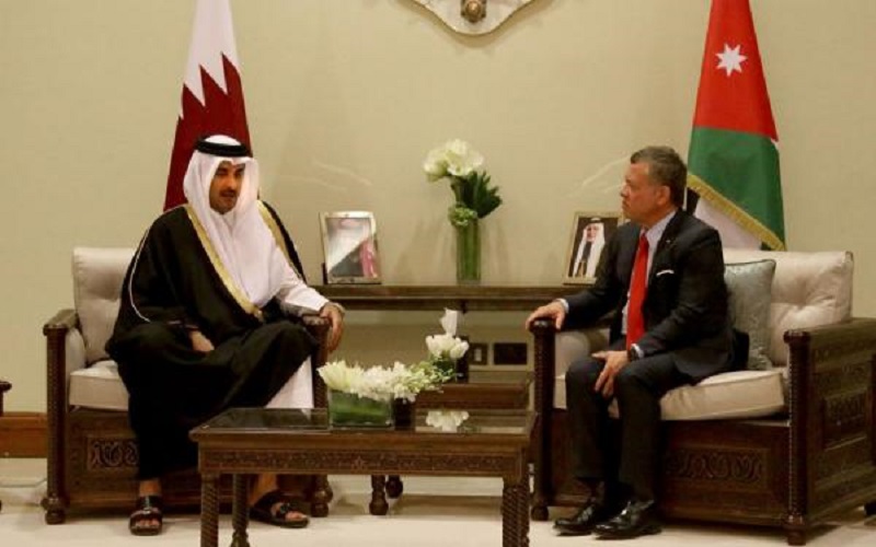 الملك وأمير قطر يؤكدان ضرورة وضع