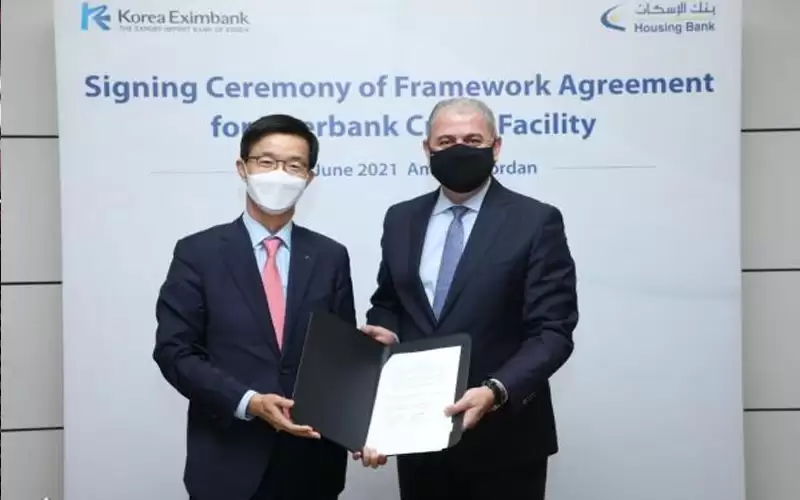 بنك الإسكان يوقع اتفاقية مع بنك