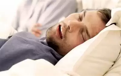 أسباب انقطاع التنفس أثناء النوم