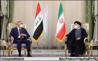 رئيسي خلال لقائه الكاظمي العلاقات