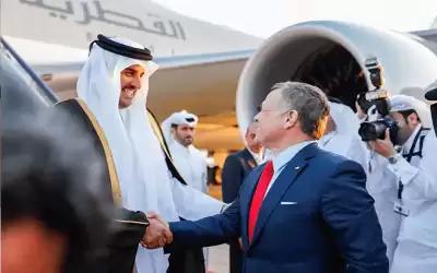 أول زيارة رسمية للملك الى قطر