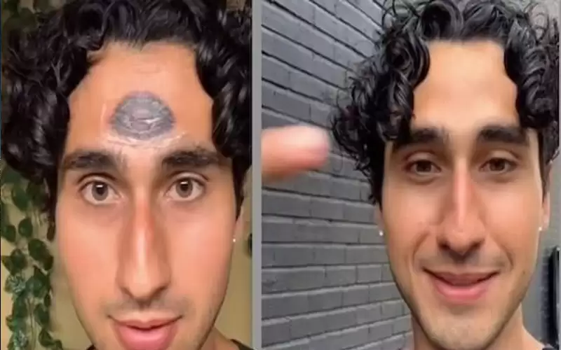 يرسم عينا ثالثة على جبهته ليمنع