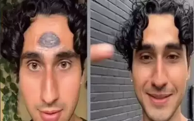 يرسم عينا ثالثة على جبهته ليمنع