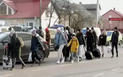 أوكرانيا تحذر من تسونامي هجرة مع