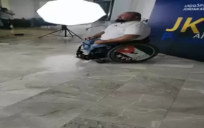 (الأردني الكويتي) يوزع الملابس على طلاب