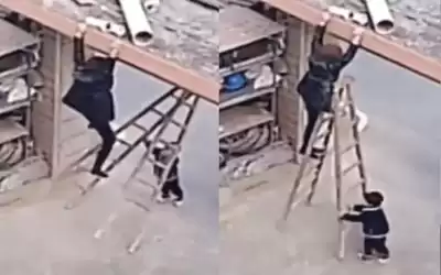 بالفيديو: طفل ينقذ أمه من السقوط