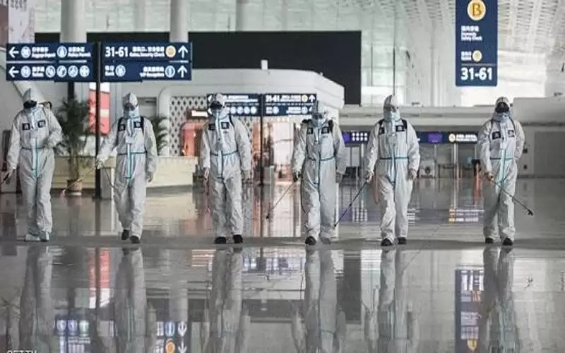 إعلام صيني: قيود السفر تمييزية