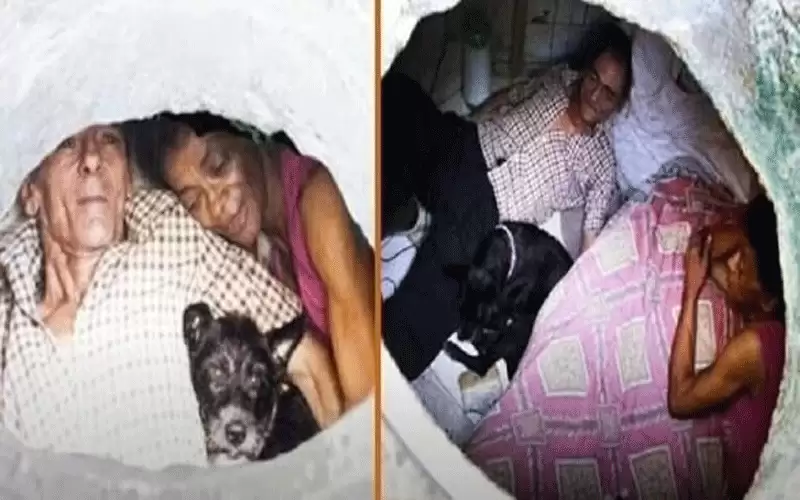 يعيشان في مصرف مياه منذ 22