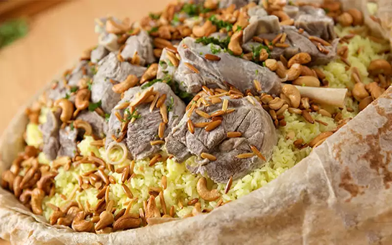 تقسيط عزيمة المنسف يثير الجدل بالأردن