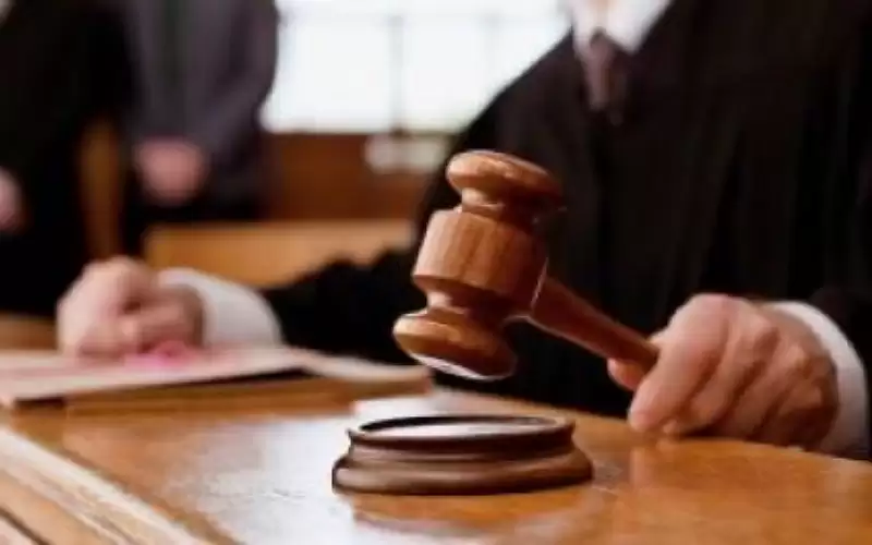 السجن 12 سنة بحق 13 شخص