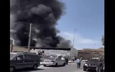 الدفاع المدني يخمد حريق مستودع في