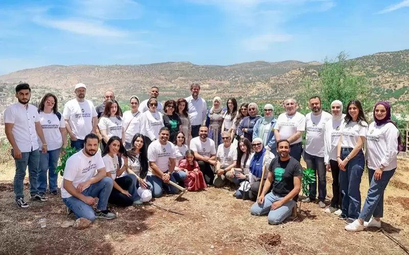 موظفو الأردني الكويتي يشاركون في القافلة