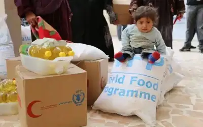 برنامج الأغذية يقلص مساعداته الشهرية بالأردن