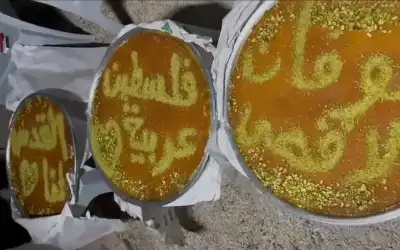 أردنيون يوزعون الحلوى ابتهاجا بـطوفان الأقصى