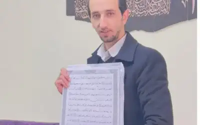 شاب أردني ينسخ القرآن الكريم بخط