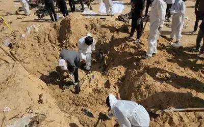 تقرير: دفن أكثر من 20 فلسطينا