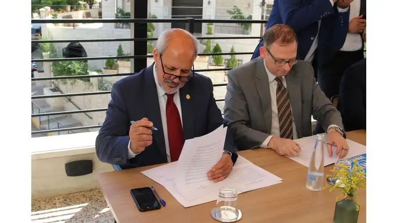 مذكرة تفاهم بين الطفيلة التقنية والمفوضية