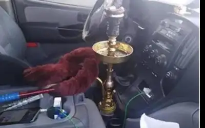ضبط سائق عمومي يدخن الأرجيلة أثناء